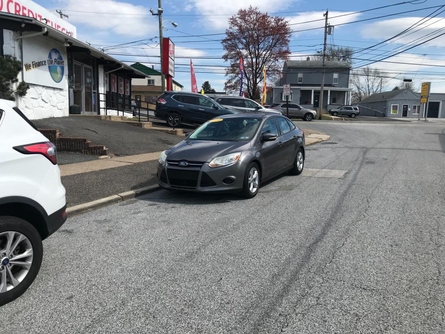 2014 Gray /Gray Ford Focus (1FADP3F23EL) with an 2.0 engine, Automatic transmission, located at 577 Chester Pike, Prospect Park, PA, 19076, (610) 237-1015, 39.886154, -75.302338 - Photo#1